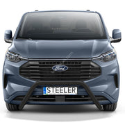 Front view of a blue-gray Ford Transit Custom van with a black front bull bar and a custom license plate reading 'STEELER', shown on a white background.